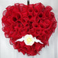 Heart shaped wreath with rose and birds