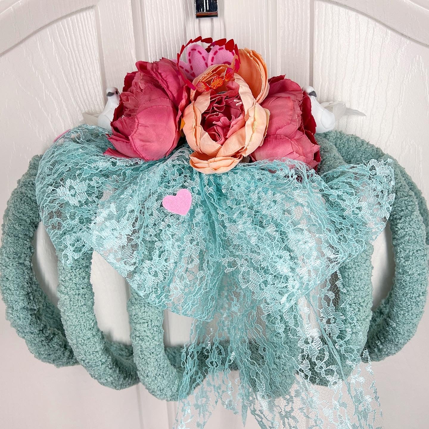 Romantic wreath with flowers and birds