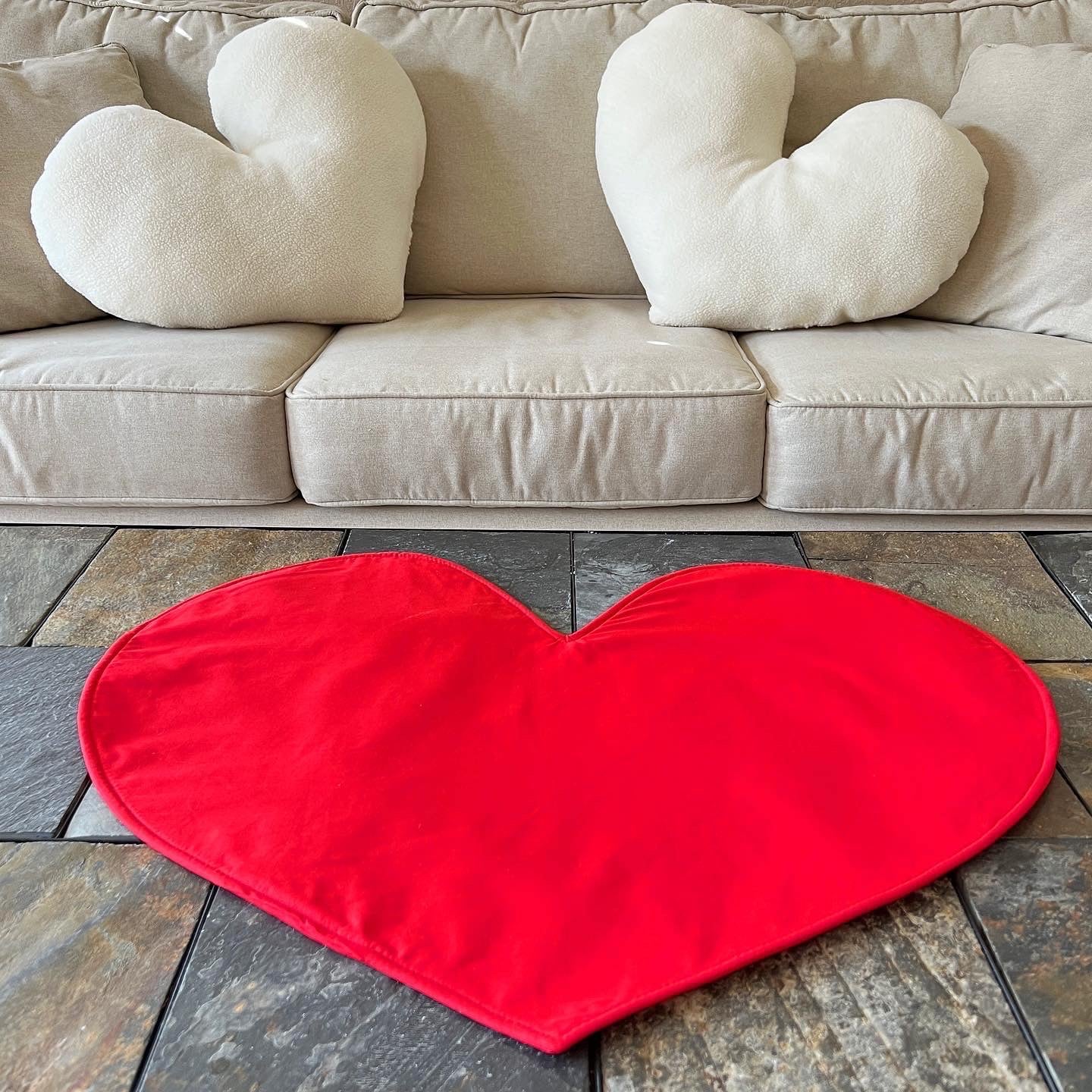 Oversized Sherpa heart pillow